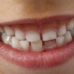 when should a child brush their own teeth
